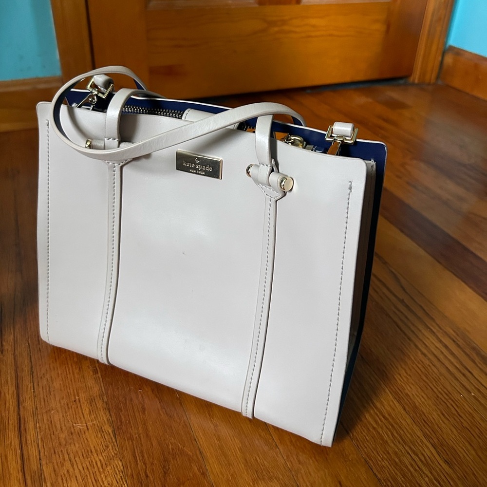 Kate Spade Pale Beige Medium Satchel Bag with Navy Blue details.